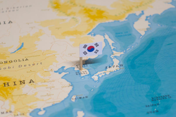Imagen de bandera de Corea del Sur en un mapamundi.